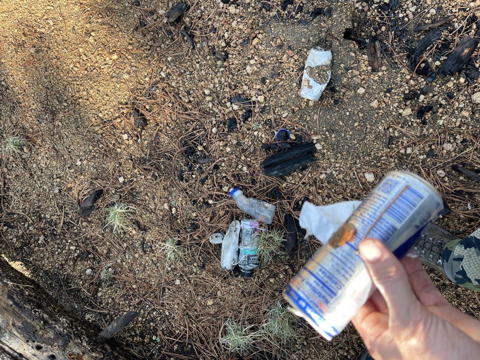 Packing out litter to leave the land better